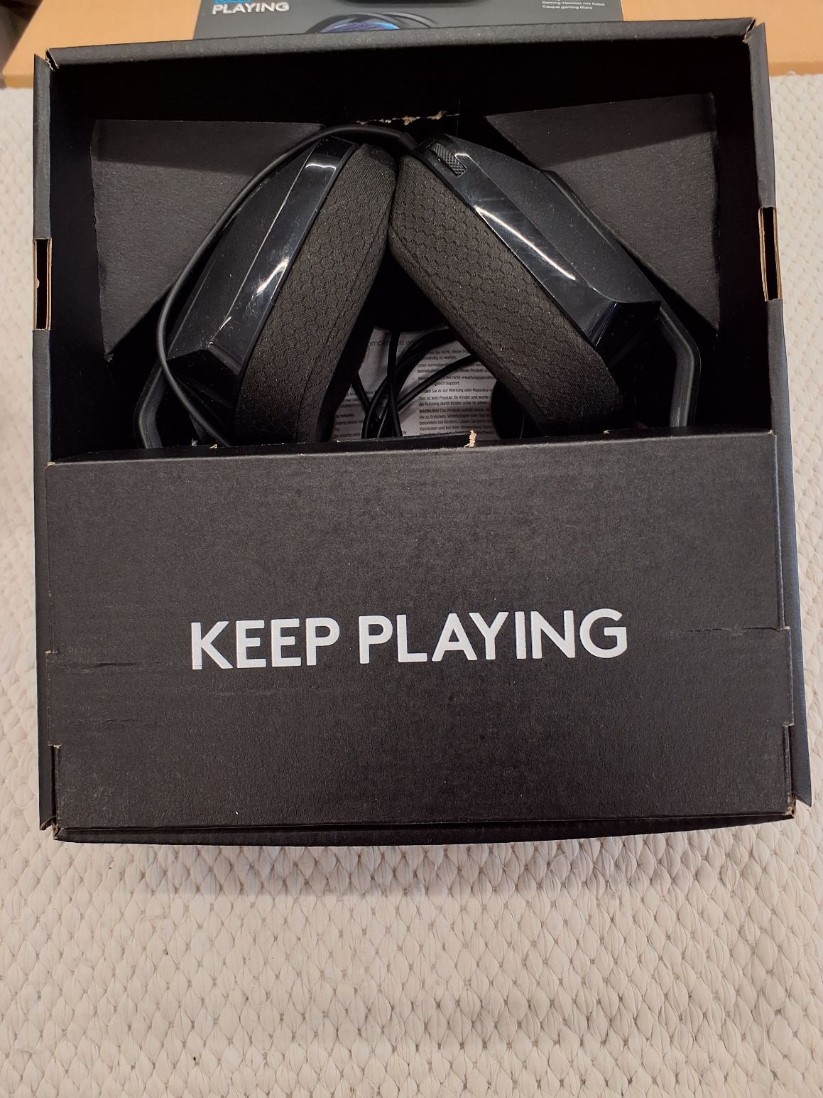 Logitech G335